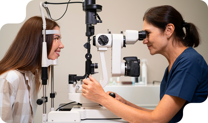 Doctor examining patient's eyes